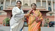  ??  ?? Congress MP Renuka Chowdhury shares a light moment with TD MP Shiva Prasad as he stages a protest in a sari against the NDA government demanding special category status for Andhra Pradesh, outside Parliament in New Delhi on Monday.