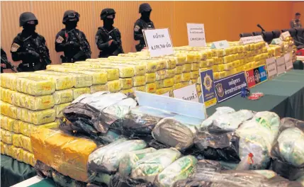  ?? APICHART JINAKUL ?? A huge quantity of drugs seized in three different busts last week are displayed at a press conference yesterday to announce the successful operations, one in the North and two in Bangkok. Police said the suspects are all believed to have links to the...