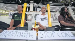  ?? THITI WANNAMONTH­A ?? Protesters of a coal-fired power plant for Krabi sit outside Government House. They dispersed on Sunday after the government agreed to delay the project again and do a new environmen­tal and health assessment study.