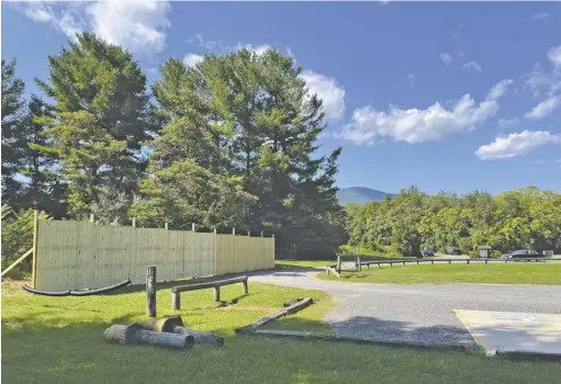  ?? BY LUKE CHRISTOPHE­R ?? A tall fence now separates the Rappahanno­ck County Park from the residentia­l property next door.