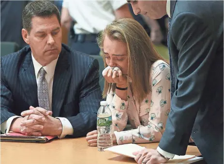  ?? GLENN C. SILVA,AP ?? Michelle Carter, flanked by defense attorneys Joseph Cataldo, left, and Cory Madera, is found guilty of involuntar­y manslaught­er Friday in the suicide of Conrad Roy III in Bristol Juvenile Court in Taunton, Mass. Carter could face up to 20 years in...