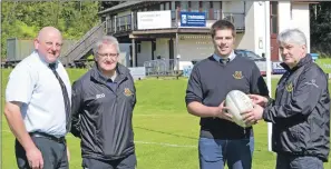  ?? Photo: Iain Ferguson, The Write Image ?? From left, Lochaber RFC president Alastair MacKinnon, First XV coach Stewart Sandison, team captain Callum MacDonald and coach Gary Hendrie look forward to a new season and a new league.