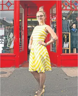  ?? Pictures: Kris Miller/ David Venni. ?? Anastasija Avenina, above, models one of the dresses donated by Lorraine, right, and Karen Kelbie, top right, Shelter Scotland shop manager, shows off the dresses.