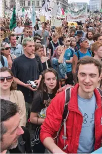  ??  ?? Address: Greta Thunberg, and right, her supporters gather in Parliament Square yesterday