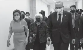  ?? Tribune News Service/getty Images ?? Speaker of the House Nancy Pelosi, D- Calif., left, and Senate Majority Leader Charles Schumer, D- N.Y., right, walk with Treasury Secretary Janet Yellen at the U.S. Capitol on Sept. 23 in Washington, D.C.