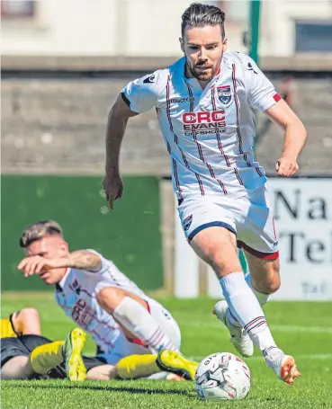 ??  ?? ON THE MOVE: Ryan Dow in action for Ross County