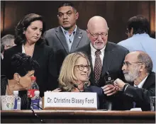  ?? WIN MCNAMEE GETTY IMAGES ?? Christine Blasey Ford (C) and her attorneys Debra Katz (L) and Michael Bromwich take a break from testifying.