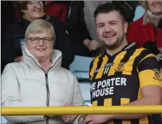  ??  ?? Conor ‘Bomber’ Byrne of Shelmalier­s receives the man of the match award from Margaret Doyle after Saturday’s JHC final replay.
