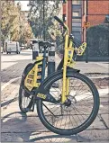  ?? TOM JAMIESON/THE NEW YORK TIMES ?? E-bikes are road or mountain bikes with an added battery-powered motor that increases riders’ pedaling power.