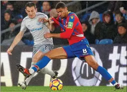  ??  ?? STRETCHING OUT: Leighton Baines (left) fights for possession with Palace’s Ruben Loftus-Cheek in a game Everton were fortunate to draw