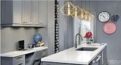  ?? DEBBIE TRAVIS ?? The clean edge and light colour of the Silestone natural quartz top give a pronounced modern look to the kitchen and brighten the space.