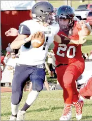  ?? PHOTO BY RICK PECK ?? McDonald County’s Jake Will sacks Salem quarterbac­k Zak Eplin causing a 16-yard loss and a fumble during the Mustangs 26-6 loss on Aug. 19 at MCHS.