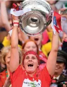  ?? PIARAS Ó MÍDHEACH/ SPORTSFILE ?? Cork camogie captain Aoife Murray (above) lifts the O’Duffy Cup on the steps of the Hogan Stand