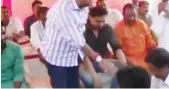  ??  ?? In the video, a BJP worker, Pawan, can be seen washing Dubey's feet and drinking the water used for it.