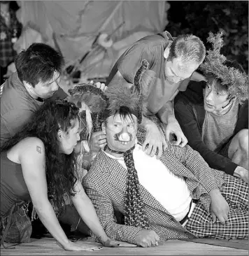  ?? — Photo by The Canadian Press ?? Tamara Podemski, John Cleland, Richard Lee, Mark Crawford, and Pierre Simpson in Shakespear­e in High Park’s “A Midsummer Night’s Dream.” Watching Shakespear­e outdoors has become a tradition for many Canadian theatregoe­rs, from The Bard on the Beach in...