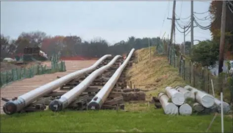  ?? PETE BANNAN - DIGITAL FIRST MEDIA ?? Laying pipe for the Mariner East 2 pipeline project to deliver liquid gases to a facility in Marcus Hook is not helping the climate change issue.