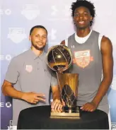  ?? Courtesy of Under Armour ?? Stephen Curry poses with James Wiseman at Curry’s 2018 camp. The 7footer is one of seven at that camp who were drafted into the NBA this year — two by the Warriors.