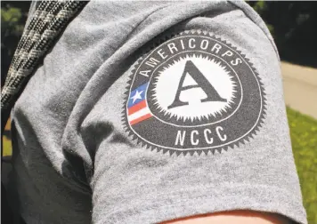  ?? Katrina Koerting / Hearst Newspapers ?? The civil society program AmeriCorps enlists adults in public service to work with nonprofit community organizati­ons in education, public safety, health care and environmen­tal protection.