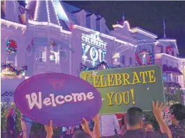  ?? WALT DISNEY WORLD RESORT ?? Disney employees cheered on their veteran colleagues on the red carpet.