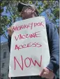  ?? THE ASSOCIATED PRESS ?? A man holds a sign urging increased access to the monkeypox vaccine during a protest in San Francisco last month.