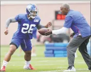  ?? Julio Cortez / Associated Press ?? New York Giants running back Saquon Barkley works out during training camp on Thursday in East Rutherford, N.J.