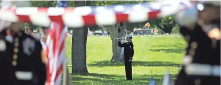  ?? RON PAGE/USA TODAY NETWORK-WISCONSIN ?? Menasha native Sgt. Elden W. Grimm, a U.S. Marine who died in battle during World War II, was buried Saturday in Neenah.