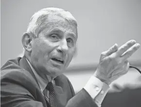  ?? KEVIN DIETSCH/POOL VIA AP ?? Dr. Anthony Fauci says not everyone would get a vaccine immediatel­y, but all who need it will get it “within a reasonable time.”