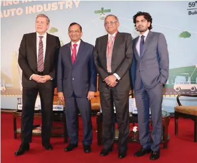  ??  ?? L to R: Guenter Butschek, CEO & MD, Tata Motors Ltd, Dr Pawan Goenka, MD, Mahindra & Mahindra Ltd., Venu Srinivasan, Chairman, TVS Motor Company Ltd., Siddharth Vinayak Patankar - Editor In Chief, Auto, NDTV.