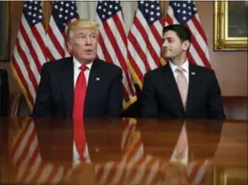  ?? ALEX BRANDON — ASSOCIATED PRESS ?? President-elect Donald Trump and House Speaker Paul Ryan pose for photograph­ers after a meeting in the Speaker’s office on Capitol Hill in Washington, D.C., on Thursday.