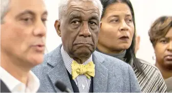  ?? SUN-TIMES FILES ?? The Rev. Leon Finney Jr. listens as then-Mayor Rahm Emanuel speaks in December 2017.