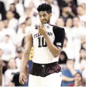  ?? David J. Phillip / Associated Press ?? Arrested on Sunday, A&M’s Tonny TrochaMore­los was back on the court Tuesday.