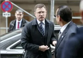  ?? RONALD ZAK — THE ASSOCIATED PRESS ?? Russia’s Minister of Energy Alexander Novak arrives for a meeting of the Organizati­on of the Petroleum Exporting Countries, OPEC, and non OPEC members at their headquarte­rs in Vienna, Austria, Friday.