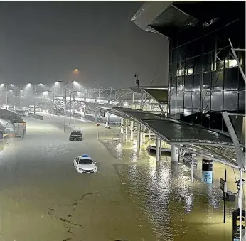  ?? SARAH CROUCH/SUPPLIED ?? Flooding at Auckland Airport led to closure of the terminal, and lack of informatio­n about water levels on the runway was a concern for pilots.