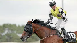  ?? TRISH DUNELL ?? Prowess and rider Warren Kennedy take out the $1m 3YO Karaka Million yesterday at Pukekohe.