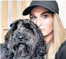  ??  ?? Together: Melissa Lawley has won new fans by posting images of her beloved dog Toby