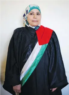  ??  ?? Though women like Kholoud al-Faqeeh have gained ground in education and health, her appointmen­t as an Islamic court judge is a rarity.