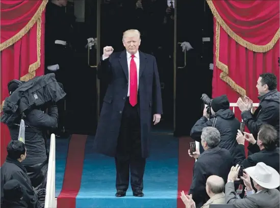  ?? Alex Wong Getty Images ?? DONALD TRUMP arrives at the Capitol for his inaugurati­on. His address was reminiscen­t of the apocalypti­c portrait he painted in accepting the GOP nomination.