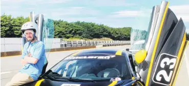  ?? PHOTO: LUISA GIRAO ?? No fear . . . Leukemia patient Ethan Smith takes a ride in a race car during the Race4Life event in Invercargi­ll.