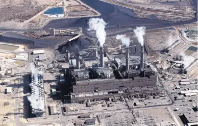  ?? SUSAN MONTOYA BRYAN/ASSOCIATED PRESS ?? On Tuesday, Public Service Company of New Mexico shut down the first of two coal-fired units scheduled to be decommissi­oned at the San Juan Generating Station near Farmington. The second will be turned off over the weekend.