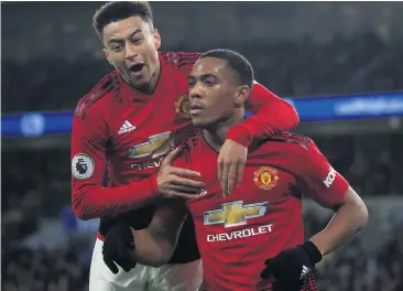  ??  ?? Main men: Anthony Martial (right) and Jesse Lingard will be out injured for at least two weeks