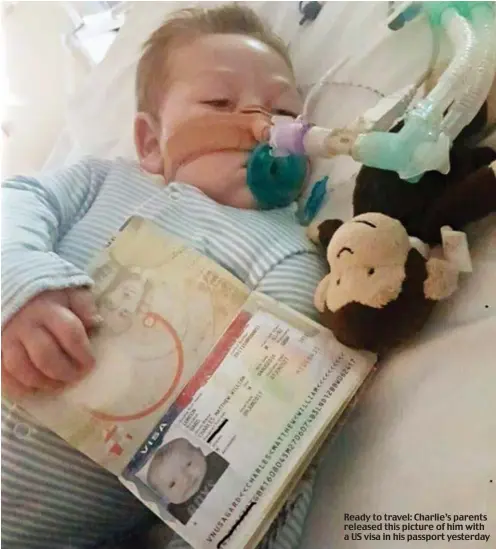  ??  ?? Ready to travel: Charlie’s parents released this picture of him with a US visa in his passport yesterday