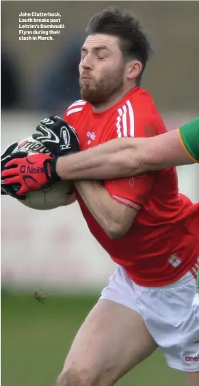  ??  ?? John Clutterbuc­k, Louth breaks past Leitrim’s Domhnaill Flynn during their clash in March.