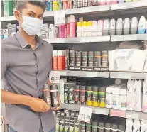  ?? Picture: SUPPLIED ?? Waseem Akram of Vomo St, Lautoka with Lynx deodorant products at Extra Supermarke­t, Lautoka.