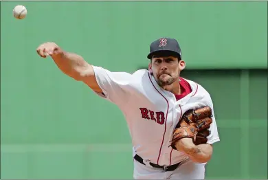  ?? STEVEN SENNE/AP PHOTO ?? Nathan Eovaldi of the Red Sox delivers a pitch in the first inning of Sunday’s game against the Twins at Boston.