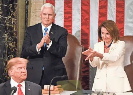  ?? JARRAD HENDERSON/USA TODAY ?? House Speaker Nancy Pelosi claps to President Donald Trump during his State of the Union in 2019. Trump’s four years in the White House became one of the most consequent­ial chapters in Pelosi’s political career.