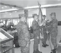  ?? PHOTO FROM THE 3RD ID’S FB POST ?? Colonel Benedict Arevalo assumes post of commander of the 301st Infantry (Bayanihan) Brigade, replacing Brig. Gen Pio Diñoso III during the change-of-command ceremony presided over by Major General Dinoh Dolina (left), commander of the 3rd Infantry...