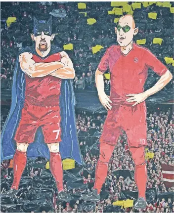  ?? FOTO: GETTY ?? Fanchoreog­raphie vor dem Pokal-Halbfinale gegen Dortmund 2015: Franck Ribéry (rechts) und Arjen Robben als Comicfigur­en Batman und Robin.