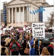  ?? ALEX FLYNN / THE NEW YORK TIMES ?? Demonstrat­ors protest cuts in pay, benefits and school funding Monday at the Oklahoma Capitol in Oklahoma City. Leaders of the state largest teachers’ union, the Oklahoma Education Associatio­n, said the strike would continue a third day today.