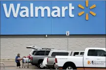  ?? JULIO CORTEZ — THE ASSOCIATED PRESS FILE ?? Walmart hopes to its new membership service, Walmart+, can compete with Amazon Prime. Called Walmart+, it will cost $98 a year or $12.95 a month, and give members same-day delivery on 160,000 items, a fuel discount at certain gas stations and a chance to check out at Walmart stores without having to wait at a register.