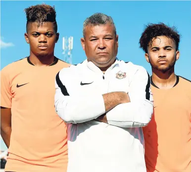  ?? Livingston Scott/Gleaner Writer ?? Phoenix Academy founder Craig Butler (centre) and standout players – his sons Leon Bailey (left) and Kyle Butler.